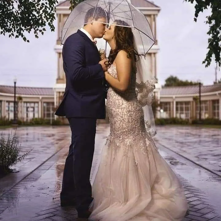 Wedding couple sharing a quiet moment outdoors